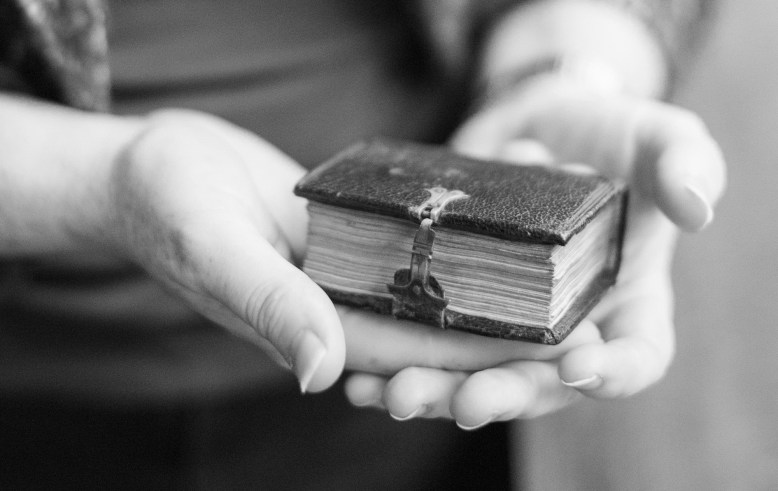 Projects Page: Hands with Book